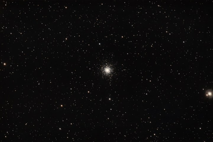 a star in the middle of the night with Gallery Arcturus in the background